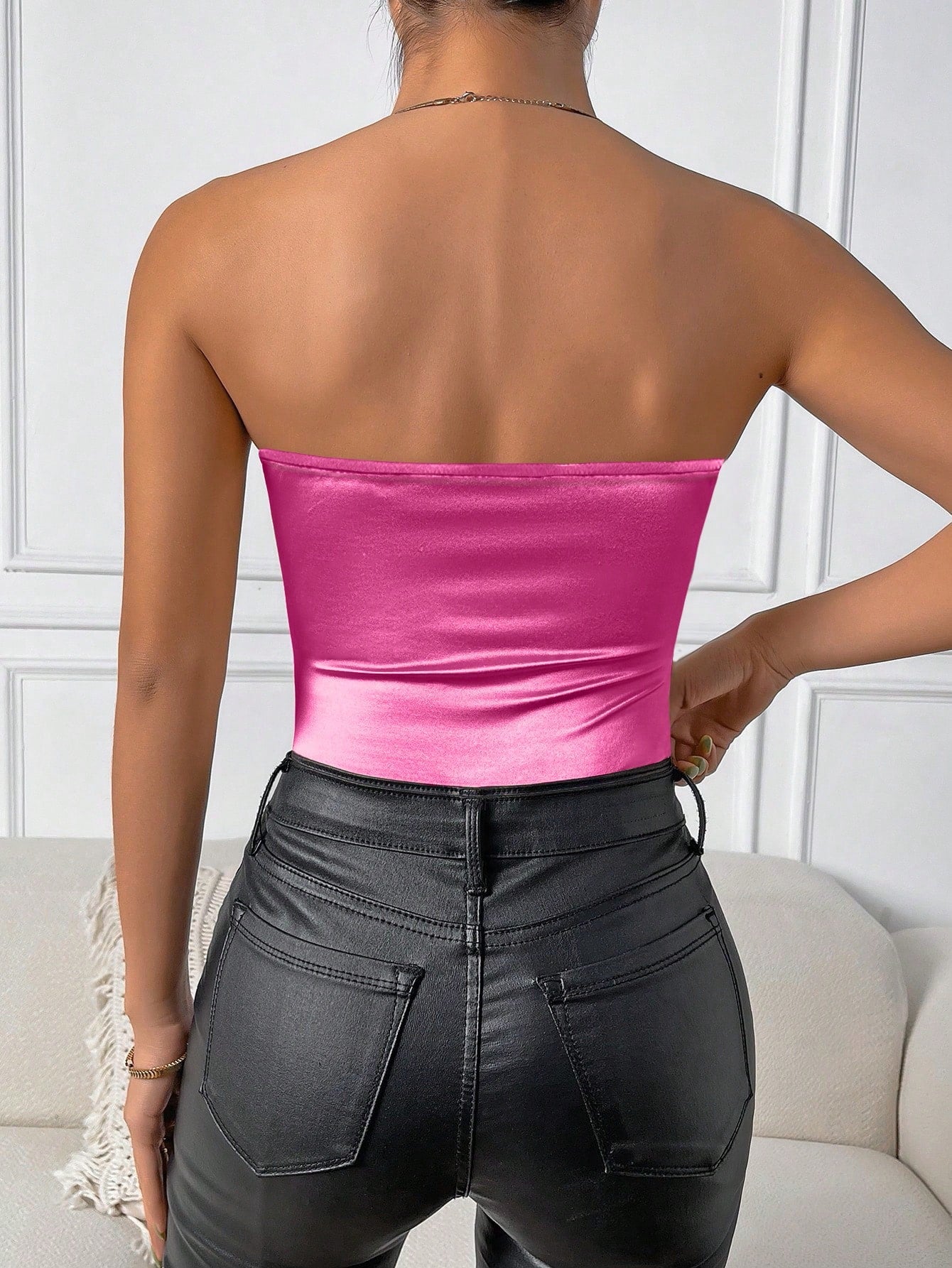 Hot pink metallic bodysuit backside