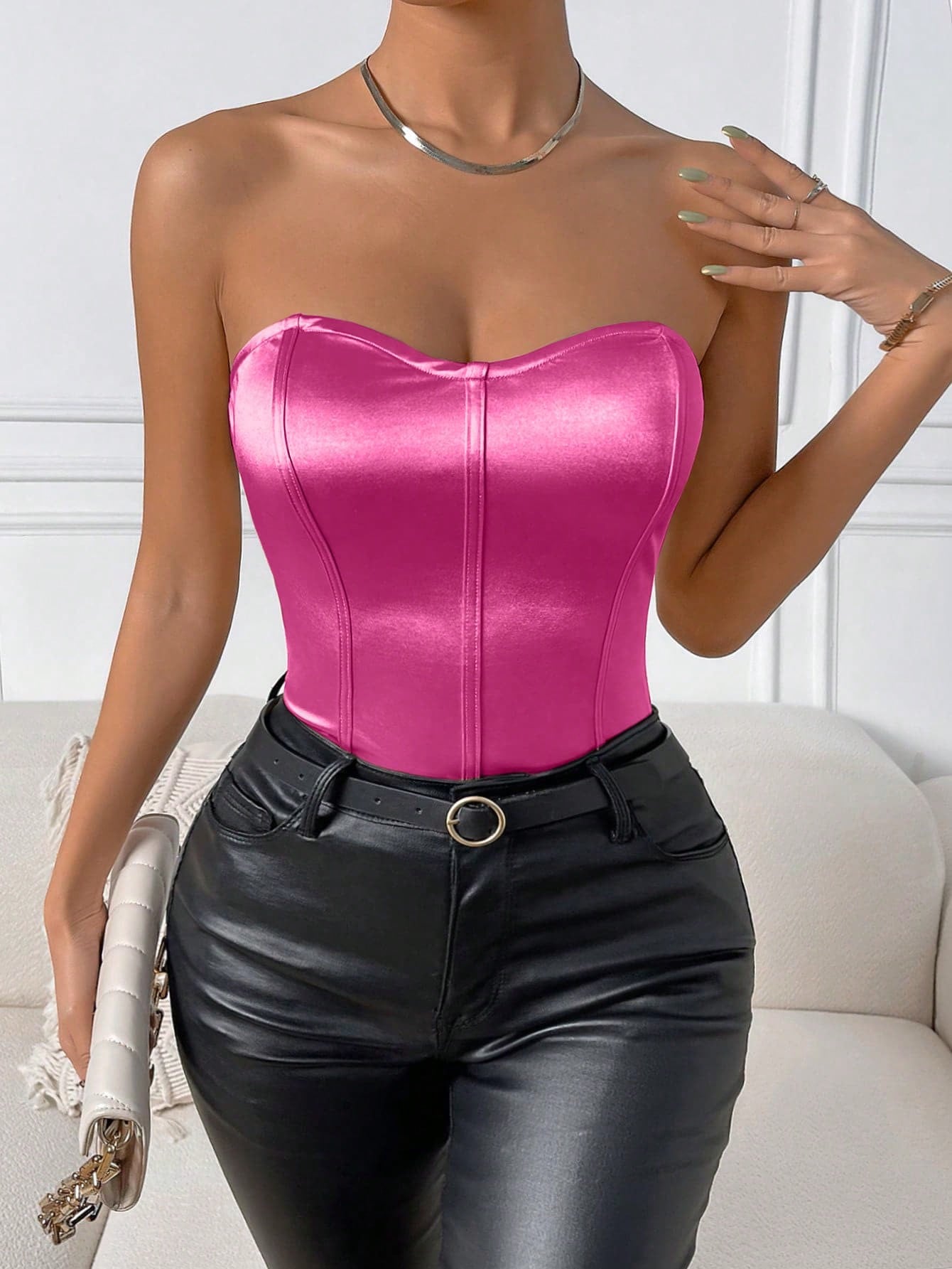Hot pink metallic bodysuit on models