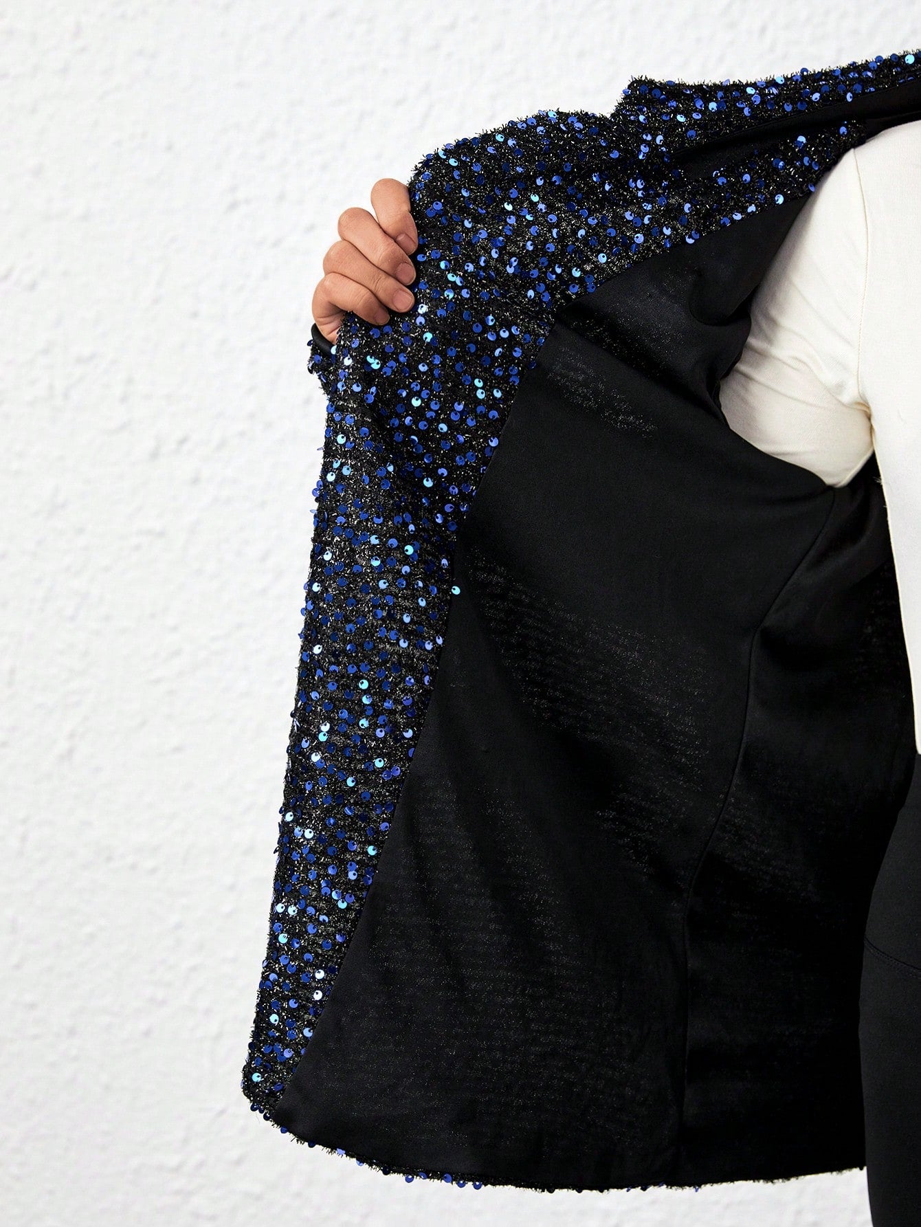 interior fabric of a Blue sparkly jacket