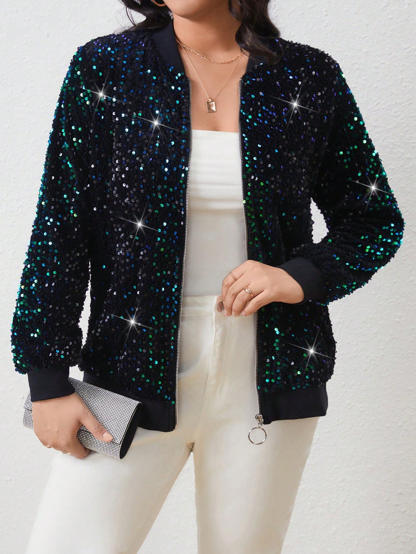 Plus size sequin bomber jacket under the light on a white background