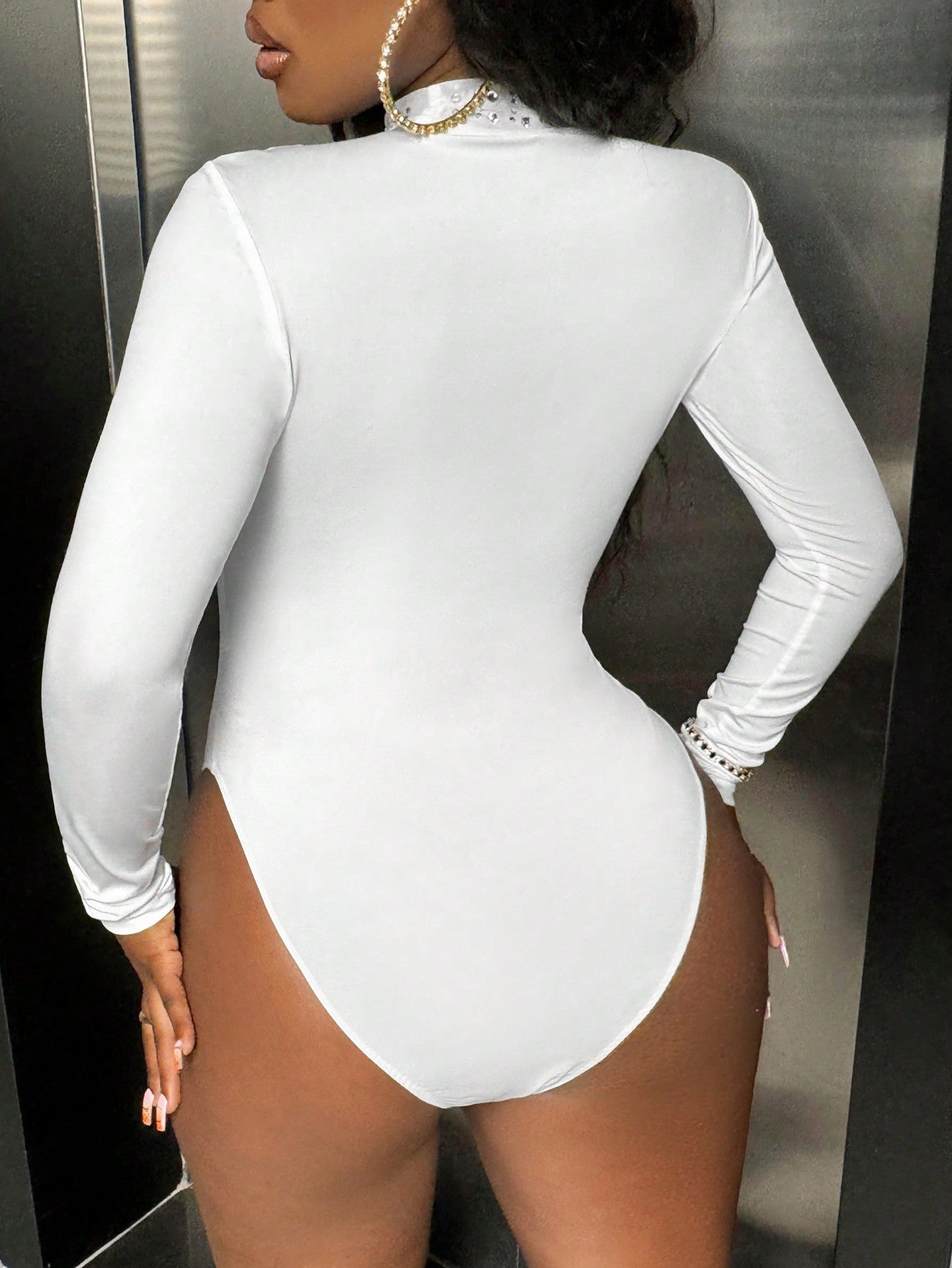 back view of a White sequin bodysuit long sleeve