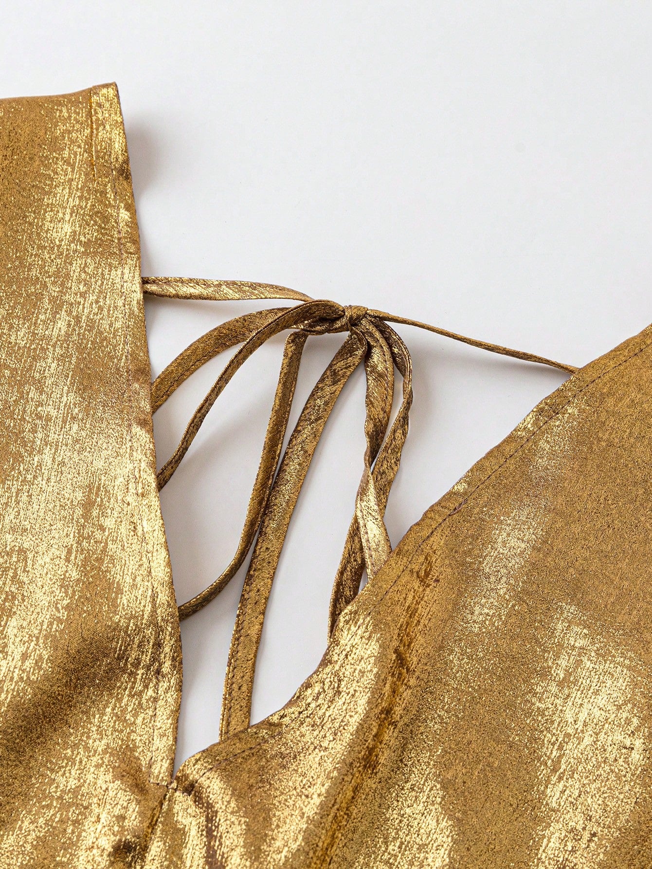zoom on the gold rope of our Plus size gold sequin bodysuit