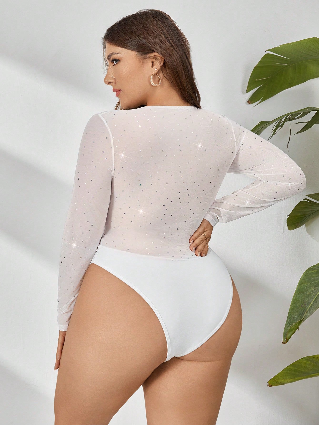 back view from a Plus size white sequin bodysuit