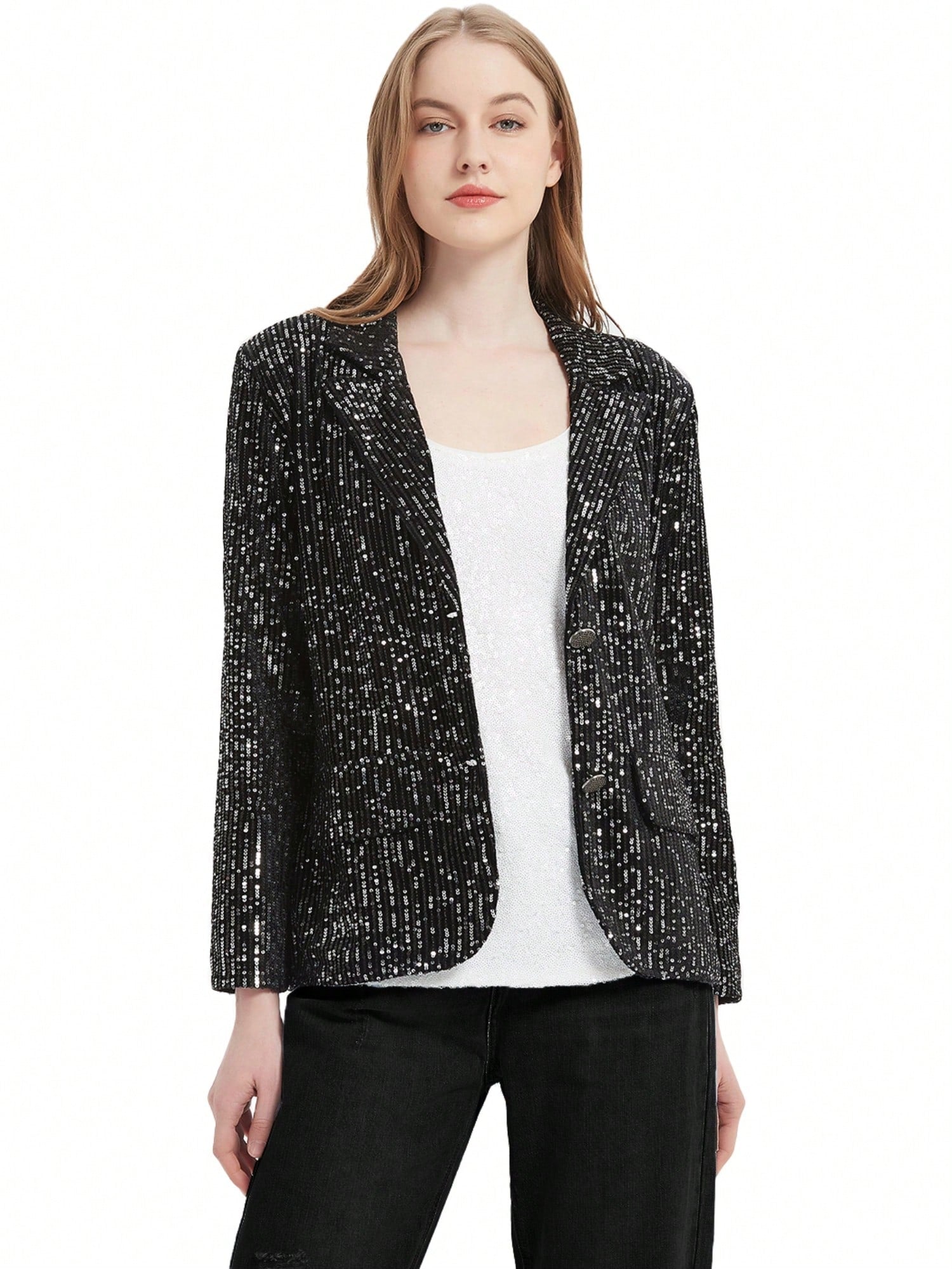 Black sequin blazer jacket worn by a blonde model on a white background