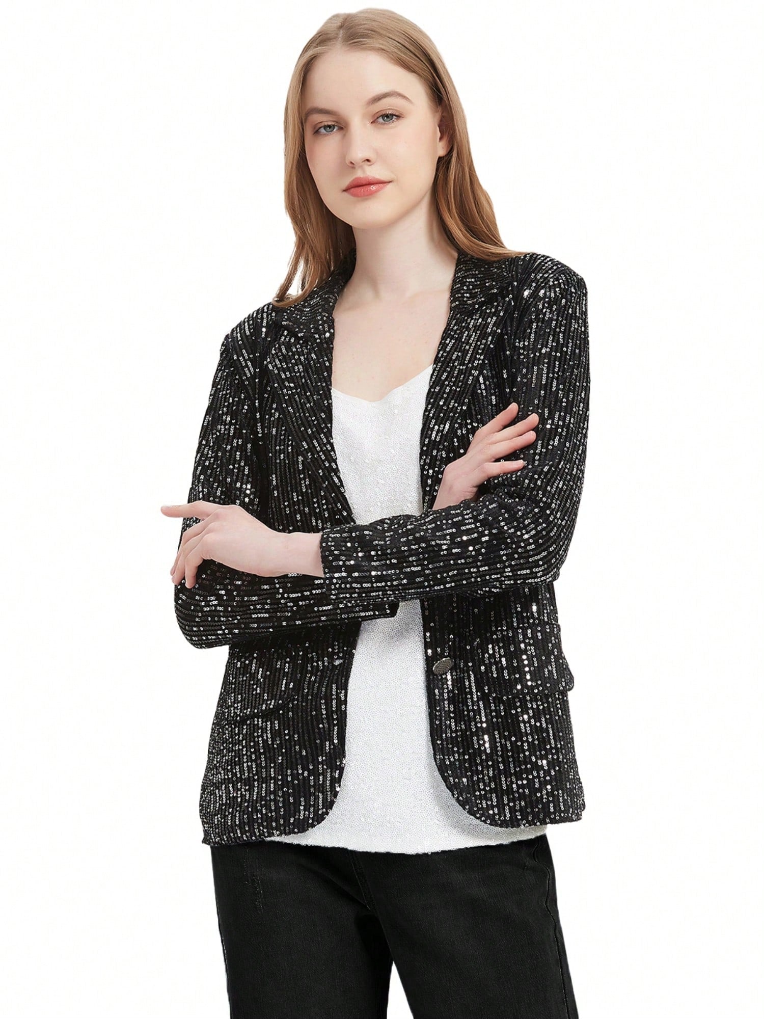 blonde white model posing for a product picture wearing a Black sequin blazer jacket with a white tshirt