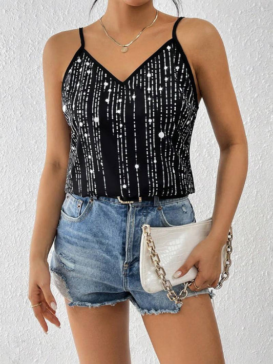 Black and silver sequin tank top on a model