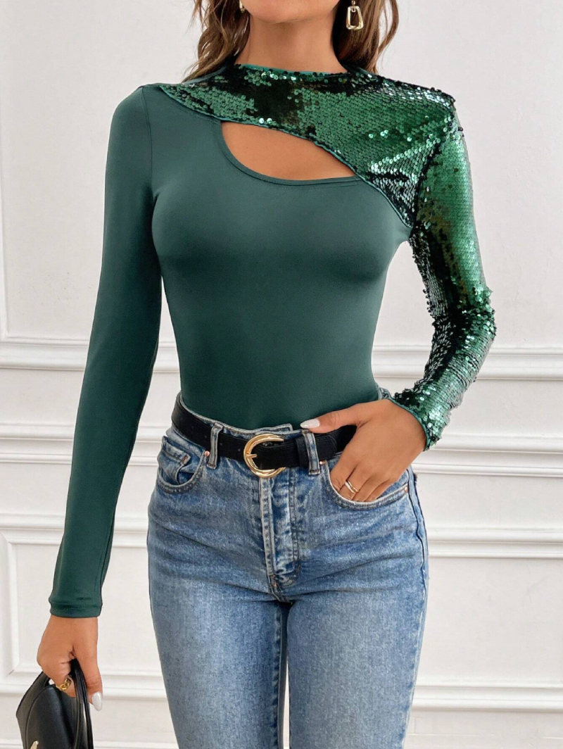 blue jeans with black belt paired with a Green sequin mermaid bodysuit on a model, white background, picture for e-shop