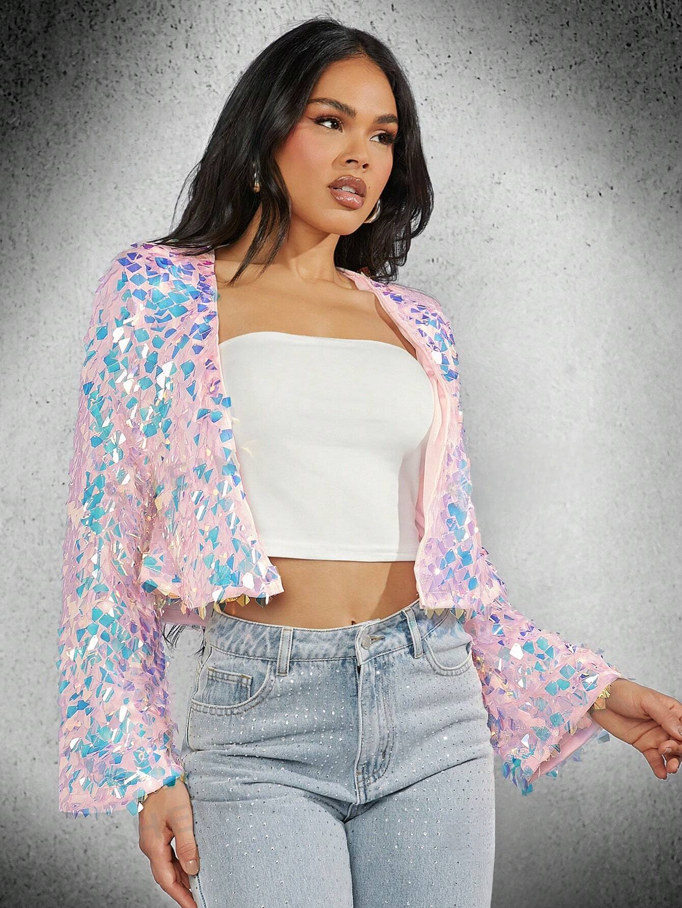 top model wearing a Pink and blue sequin jacket with a white crop top and a blue jeans, product picture