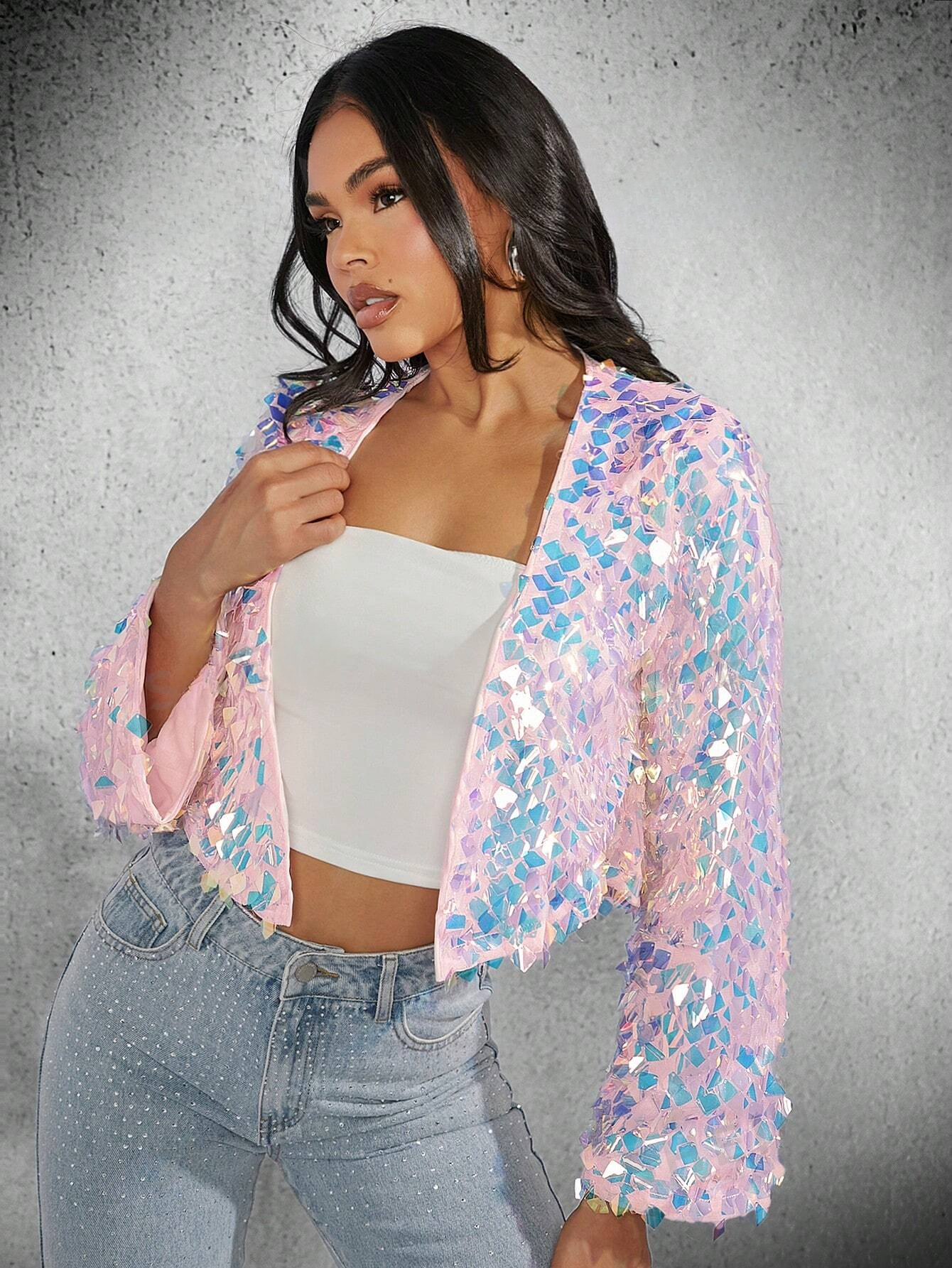 model wearing a Pink and blue sequin jacket on a white background